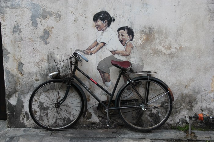 Famous street art - the kids on the bike